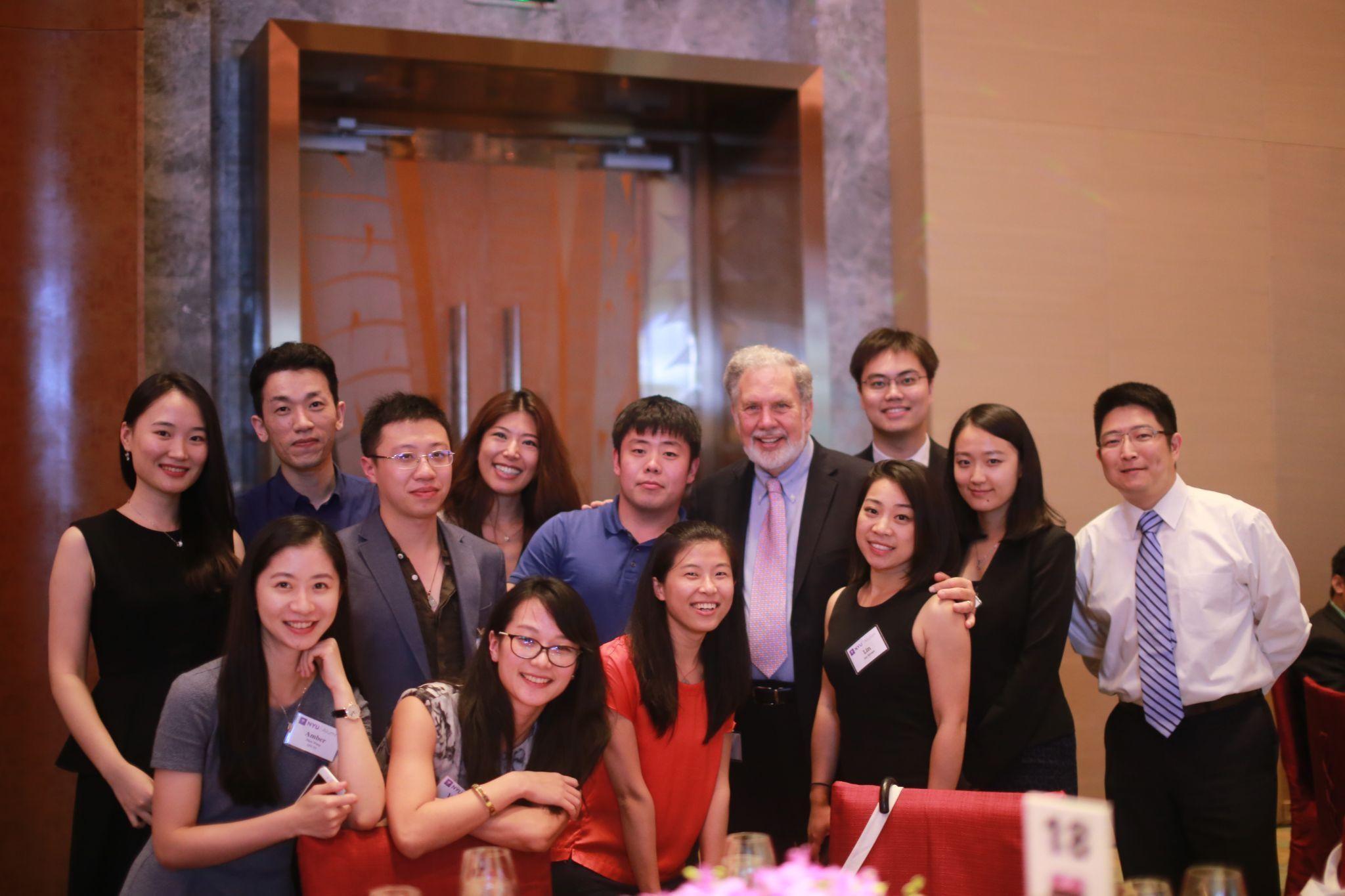 Former NYU President John Sexton with attendees